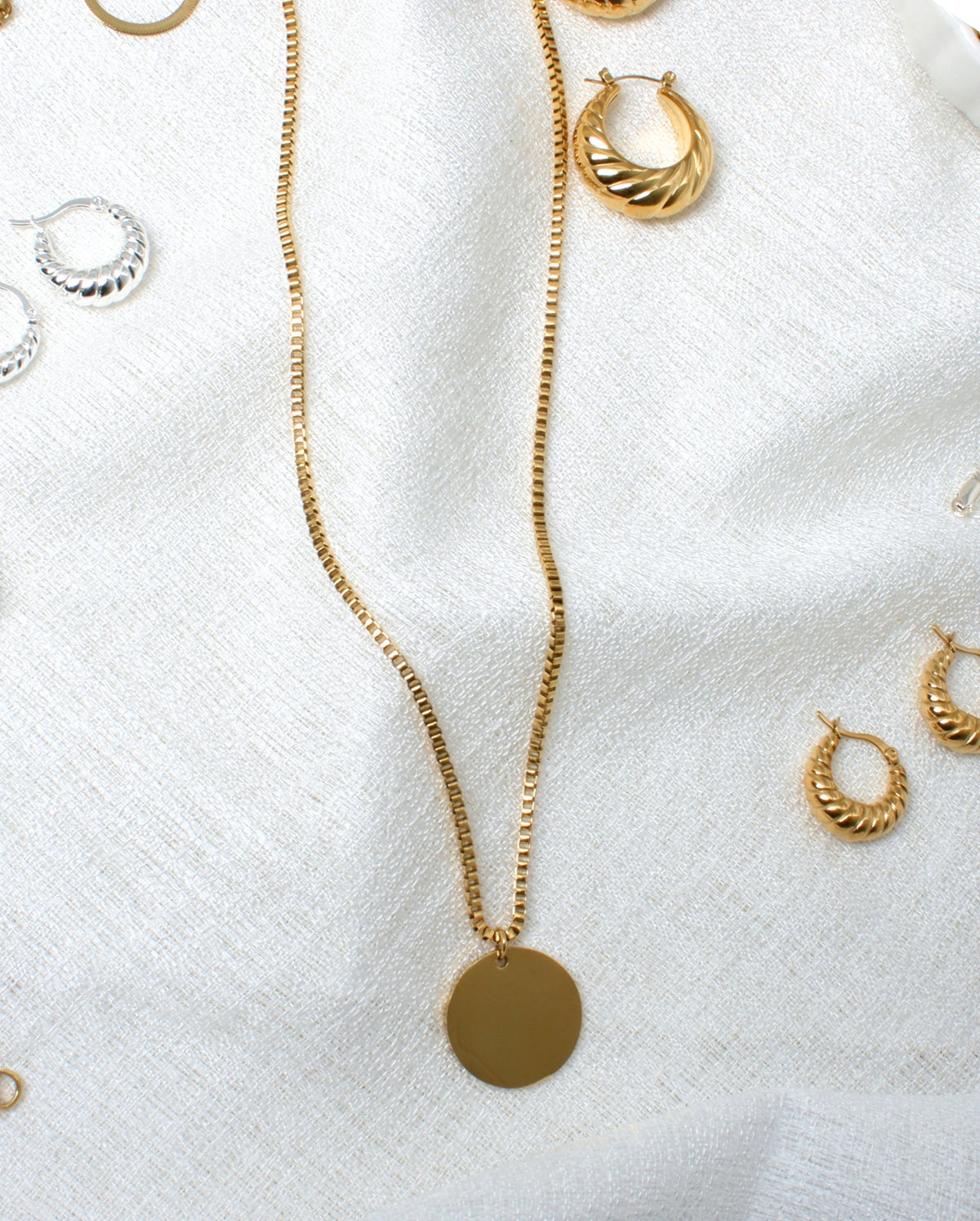 Logo Coin Pendant Gull
