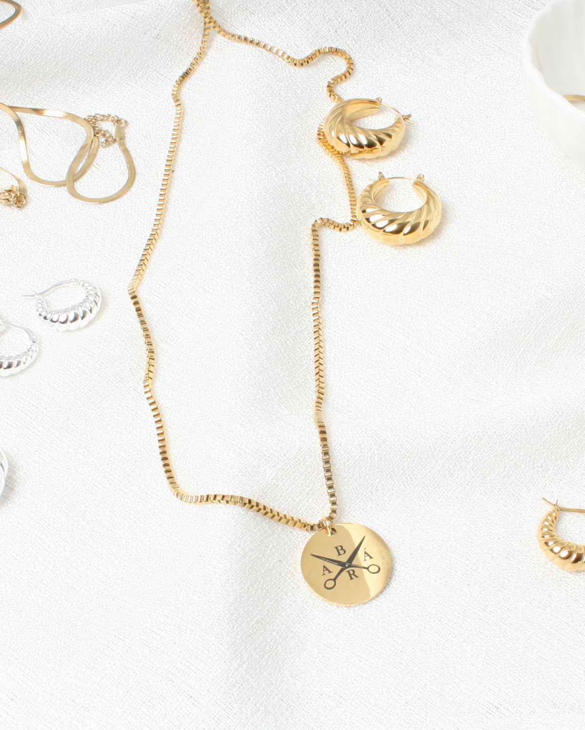Logo Coin Pendant Gull